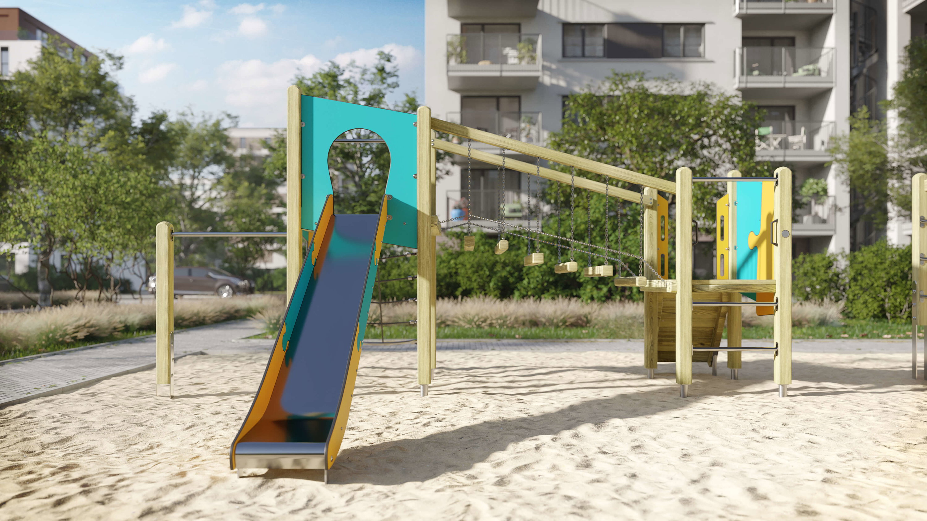 Bunte Spielhütte im Sand auf einem modernen Wohnplatz mit Bäumen und Gebäuden im Hintergrund.
