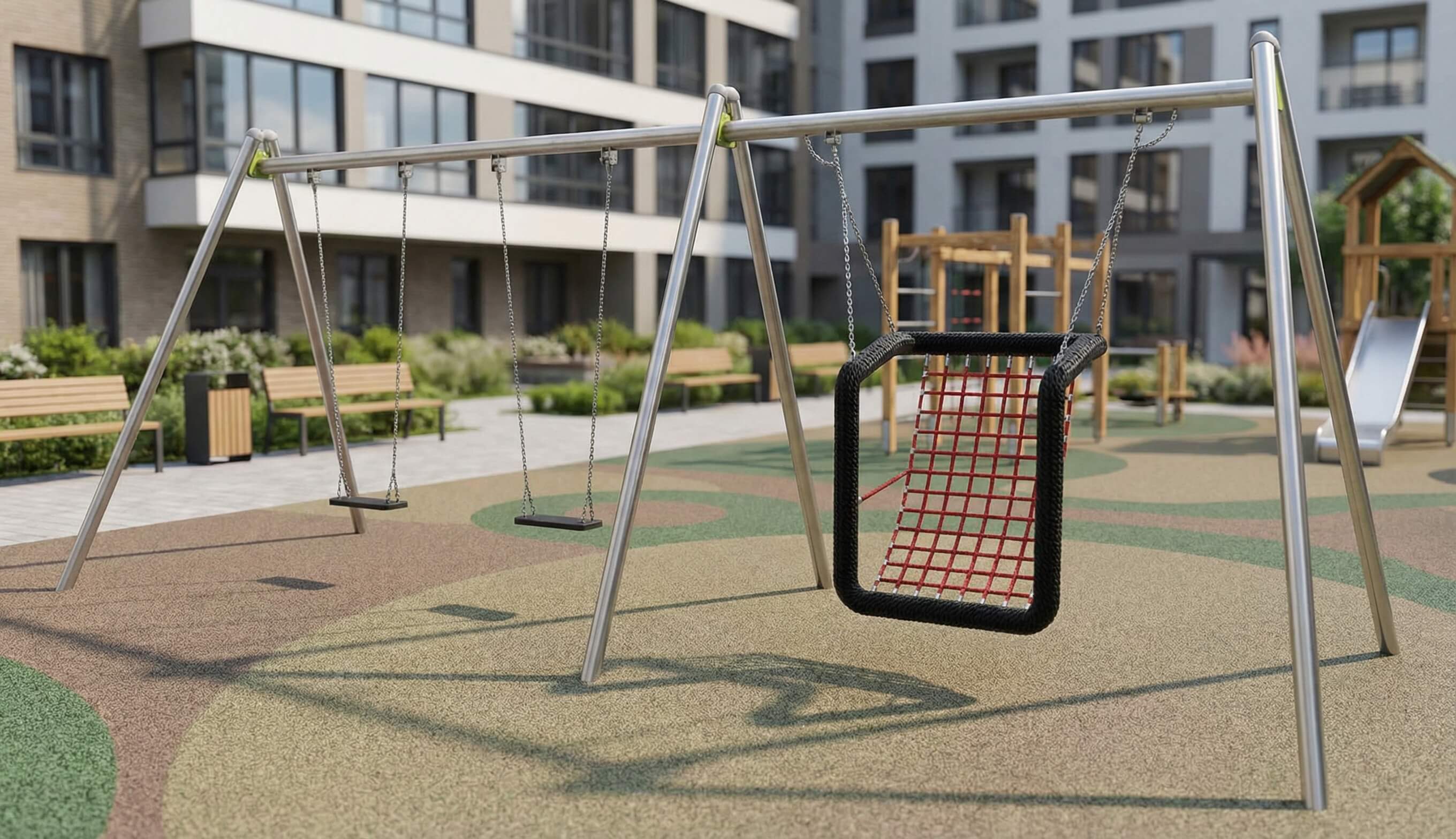Modern playground with swings und slide im Wohnkomplex mit gepflegtem Grünbereich.