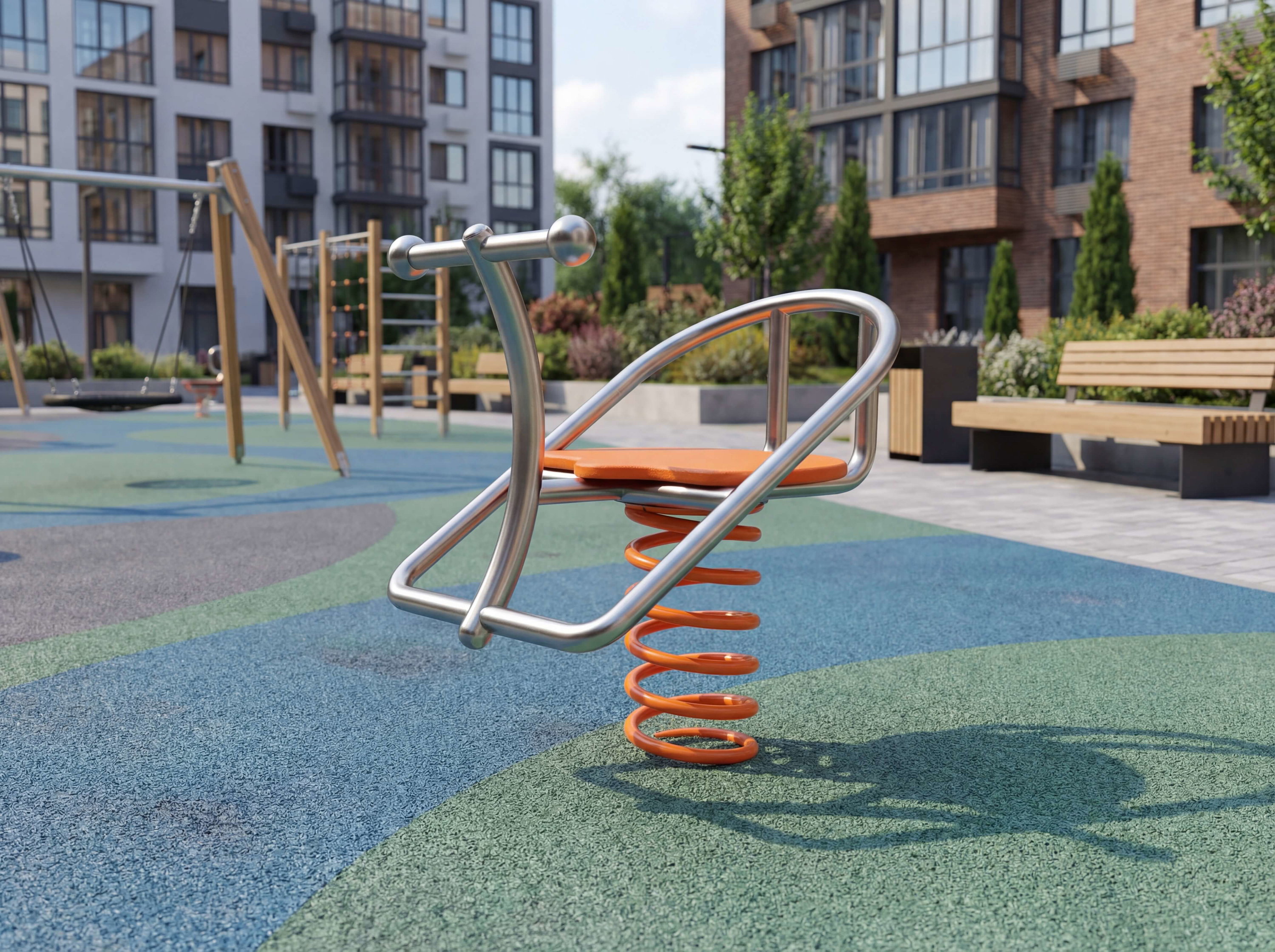 Spring-Sitzgerät auf buntem Spielplatz vor modernen Wohnhäusern – kinderfreundlich und sicher gestaltet.
