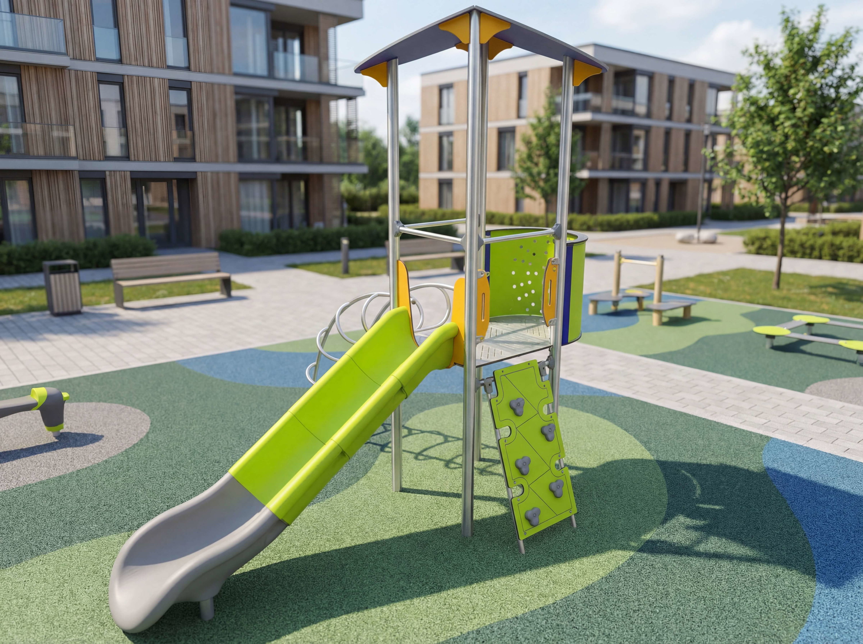 Farbiger Spielplatz mit Rutsche und Kletterwand vor modernen Wohnhäusern im Grünen.